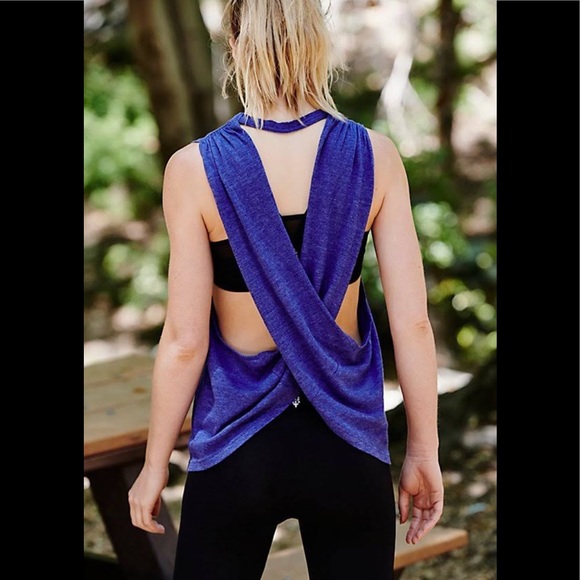 FP Movement by Free People Tops - Free people movement size xs athletic purple top with criss cross back